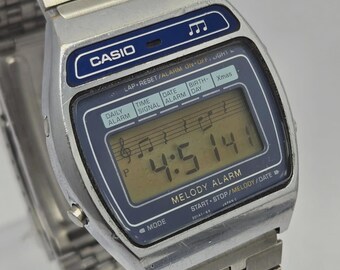 Montre Digitale Vintage TURBO 7 Melody Chrono - À Réparer Ou Pour Pièces - Occasion