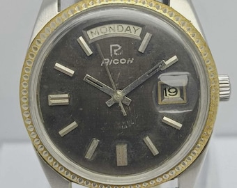 Reloj vintage automático Ricoh Sakura President con día y fecha, 21 joyas, para hombre