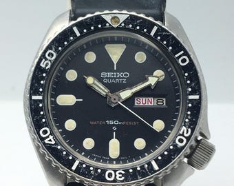 Reloj de buceo vintage Seiko Quartz 7548-7000 con día y fecha