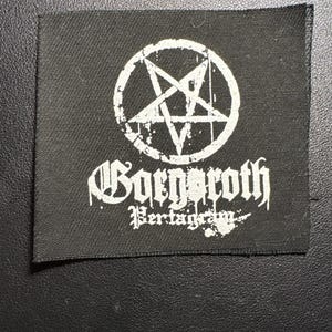 May include: Square black fabric patch with a white pentagram inside a circle. The patch features the band name "Boergeroth" and "Pertagram" in a gothic font. The design is printed in white.