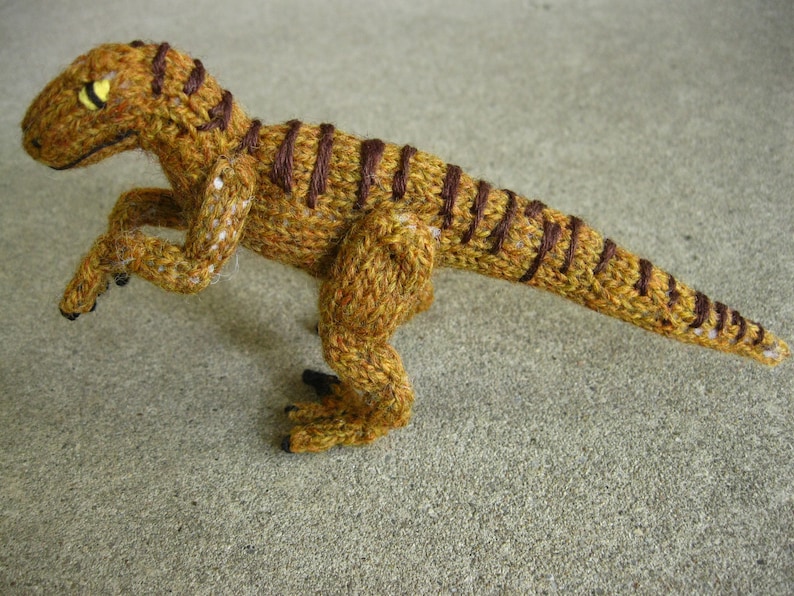 tiny velociraptor