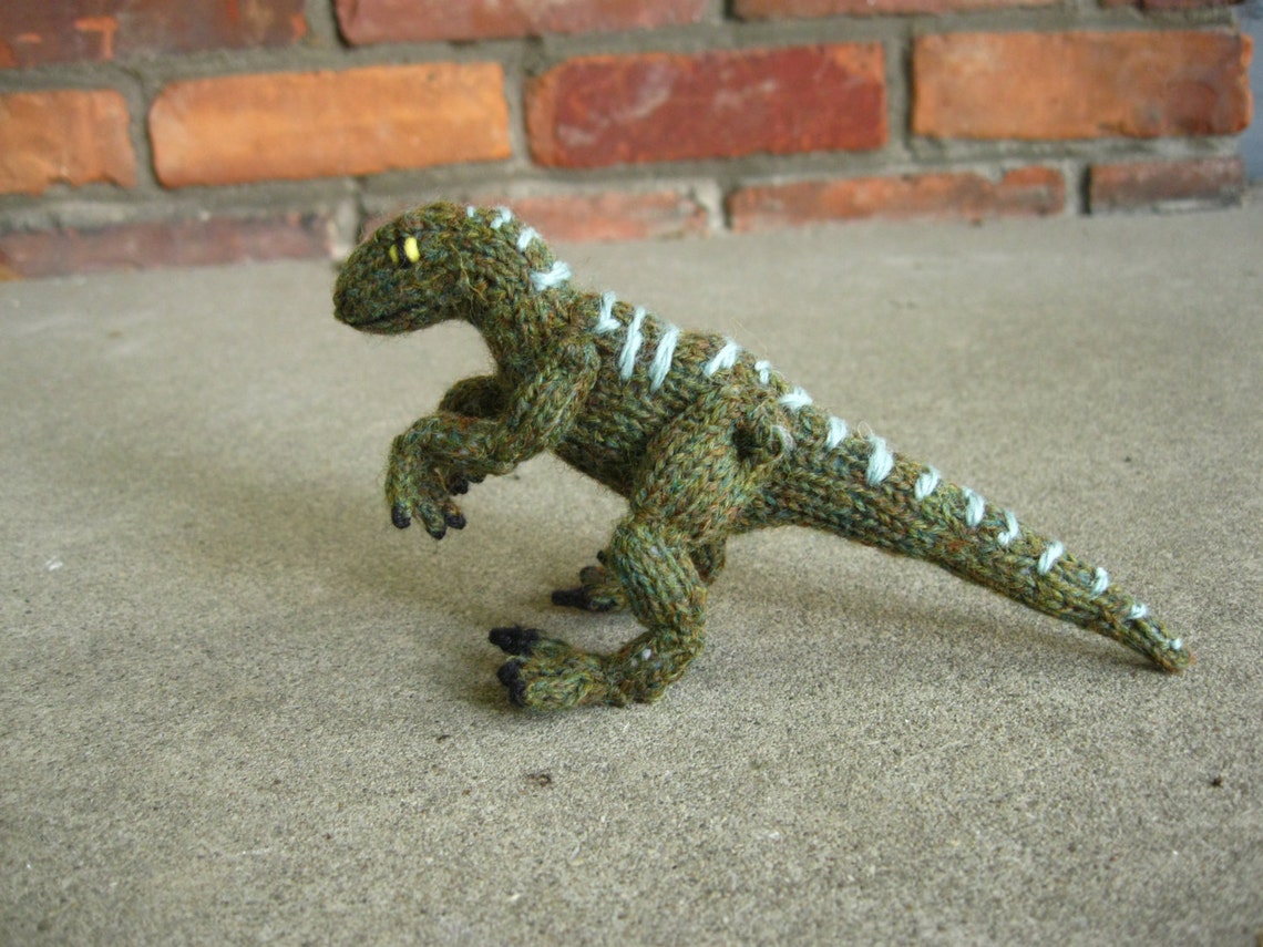 tiny velociraptor