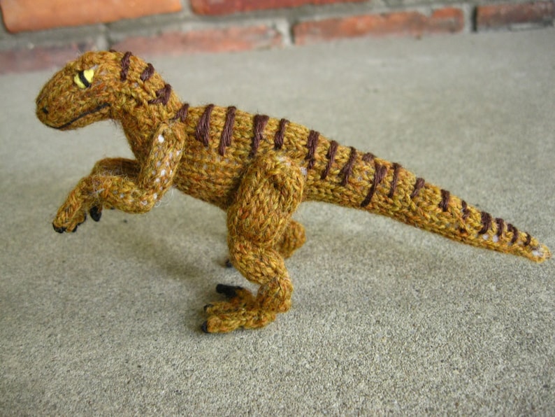 tiny velociraptor