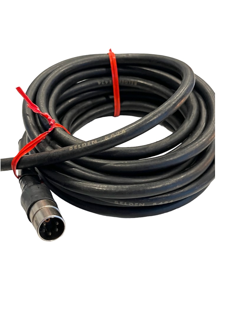 May include: A black coiled cable with a black 9-pin connector. The cable is labeled "Belden 8451".