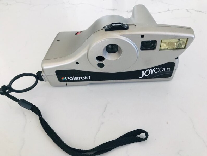 Vintage Polaroid Joycam Camera Check out all of our Polaroid Cameras