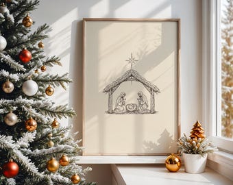 May include: A framed print featuring a black and white illustration of the Nativity scene. The artwork depicts Mary, Joseph, and baby Jesus in a manger under a rustic shelter. The print is displayed near a decorated Christmas tree.