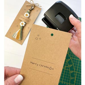 Handmade keychain packaging template with kraft display card design, printable file for macrame accessory presentation.