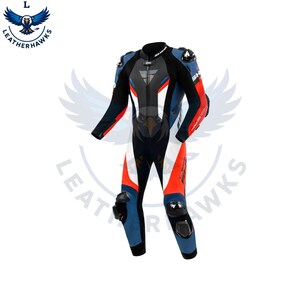 May include: A black, blue, red, and white motorcycle racing suit. The suit features a high collar, a front zipper, and protective padding on the shoulders, elbows, and knees. The suit has the word "SHARK" on the chest and "LEATHERHAWKS" printed on the left side.