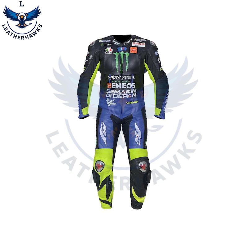 May include: A black, blue, and neon green motorcycle racing suit with sponsor logos. The suit features a Monster Energy logo on the chest and the text "ENEOS SEMAKIN DI DEPAN". The suit has protective padding on the knees and elbows.