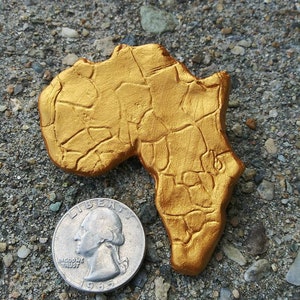 Broche de África