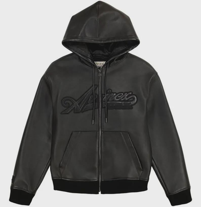 May include: Black leather zip-up hoodie with a drawstring hood and front pockets. The word "A/irex" is embossed across the chest. The jacket has a black ribbed hem and cuffs. A casual outerwear garment.