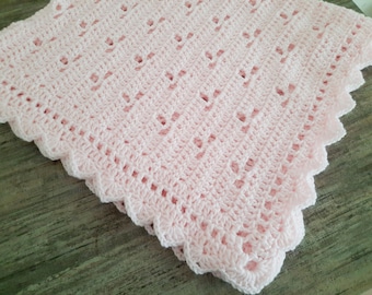 Couverture pour bébé rose au crochet