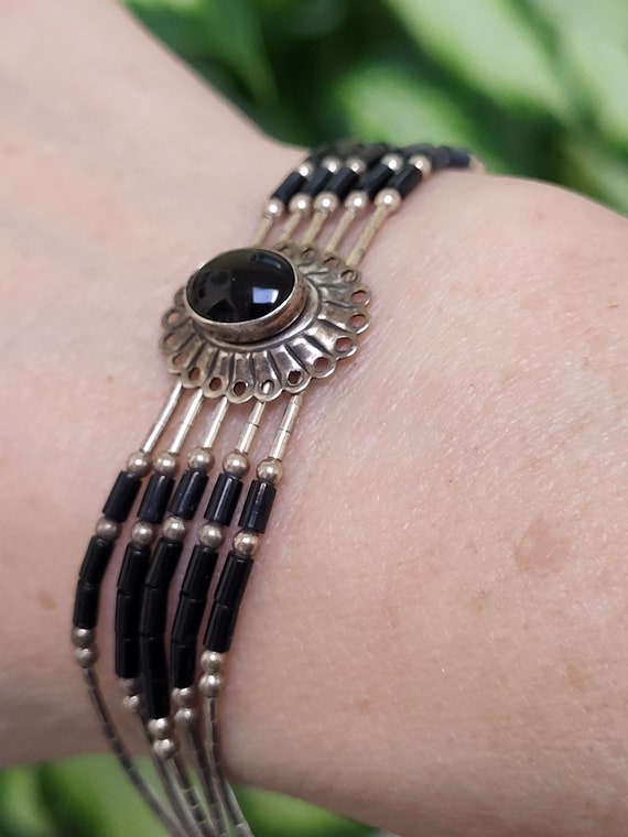 Southwestern liquid sterling and Black Onyx Bracel