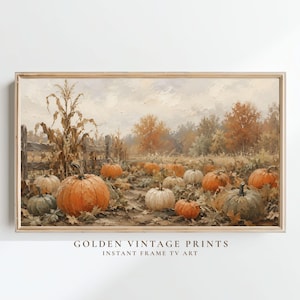 May include: A landscape painting in a wooden frame depicting a pumpkin patch with orange and white pumpkins, dried corn stalks, a wooden fence, and autumn trees under a cloudy sky. The text "GOLDEN VINTAGE PRINTS INSTANT FRAME TV ART" is below.
