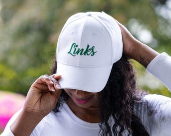 Gorra de béisbol blanca de Links, Inc.