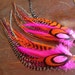 see more listings in the Long Feather Earrings section