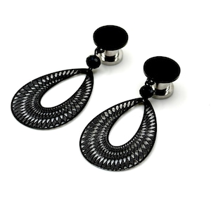 May include: A pair of black dangle earrings with a black and silver metal teardrop design. The earrings are made of surgical steel and are perfect for everyday wear.