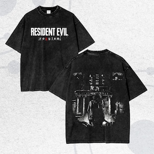 May include: A set of three ceramic mugs with a speckled, matte finish. The mugs are in shades of cream, light gray, and dark gray. Each mug has a simple, minimalist design and a rounded handle.