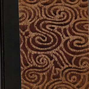 May include: A brown book cover with a dark brown spine. The cover has a pattern of swirling brown lines on a lighter brown background.