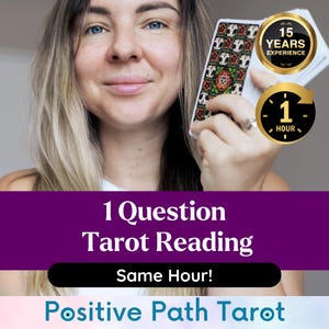 May include: A woman holding tarot cards with a decorative back design. The image includes text that reads "1 Question Tarot Reading" and "Same Hour!" along with the words "Positive Path Tarot". A gold emblem states "15 Years Experience".