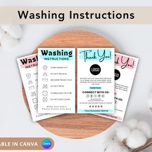 May include: A collection of business cards with washing instructions and thank you messages. The cards feature a minimalist design with text and icons, including a logo space and social media handles. The cards are on a wooden surface.
