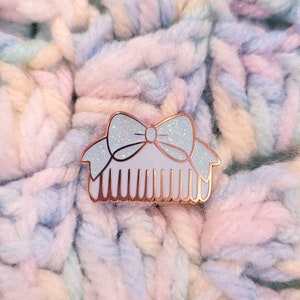 Blue comb enamel pin