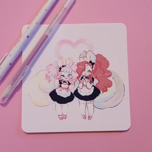 May include: Two cartoon characters dressed in maid outfits with bunny ears. The character on the left has pink hair and a white fluffy tail. The character on the right has red hair and a white fluffy tail. Both characters are holding a small heart in their hands. The background is a light pink.