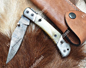 Damascusstalen zakmes met handvat van ramshoorn