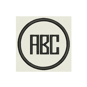 May include: A black circle with a white background and the letters "ABC" in a bold, sans-serif font.