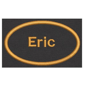 May include: A black oval patch with a gold embroidered border. The name "Eric" is embroidered in gold inside the oval.