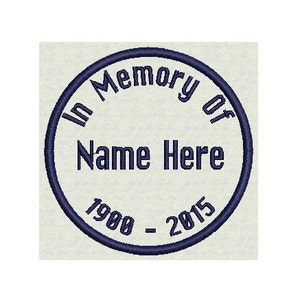 May include: A blue circle with the text "In Memory Of" at the top, "Name Here" in the center, and "1900 - 2015" at the bottom.