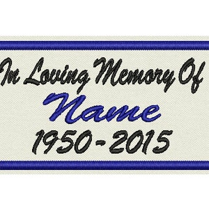 May include: In loving memory of Name 1950-2015. A white rectangular patch with a blue border, featuring black text.