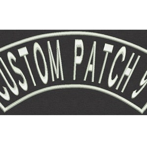 May include: White embroidered patch on a black background that says "CUSTOM PATCH 9" in a curved font.