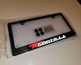 Odblaskowa ramka tablicy rejestracyjnej Godzilla GTR wykonana w 100% z włókna węglowego Premium