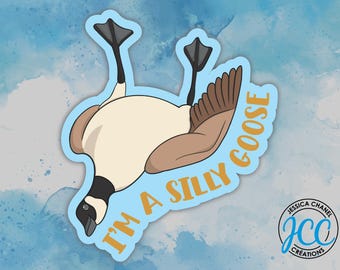 May include: A sticker featuring a cartoon goose in a comical pose, with its feet in the air. The text "I'M A SILLY GOOSE" is written in orange. The sticker has a light blue border and a watercolor background.