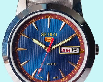 Automatic Refurbished Blue Dial Japan Made Vintage Day/Date Men's Wrist Watch.