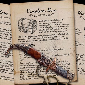 Love Doll, Vexation Box, and Healing potion pages are displayed with a sheathed ritual knife.