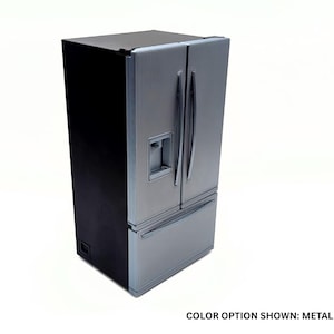 May include: A metallic gray refrigerator with a black side panel, featuring a French door design with two vertical handles, a built-in water and ice dispenser on the left door, and a bottom freezer drawer. The text reads: COLOR OPTION SHOWN: METALLIC GRAY.