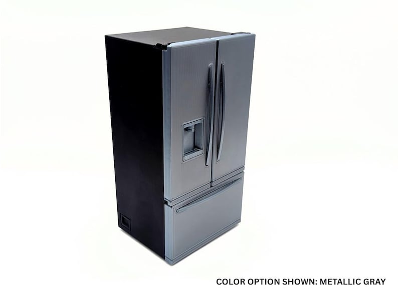 May include: A metallic gray refrigerator with a black side panel, featuring a French door design with two vertical handles, a built-in water and ice dispenser on the left door, and a bottom freezer drawer. The text reads: COLOR OPTION SHOWN: METALLIC GRAY.