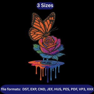 May include: An embroidered design of a butterfly with orange wings perched on a multi-coloured rose. The rose has purple, blue, and orange hues. The design includes dripping paint effects and the text "3 Sizes".