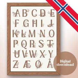 May include: A framed alphabet print featuring the letters A through Å, each letter accompanied by a sepia-toned illustration of an animal or object. The print has a wooden frame and a brown circle with the words "Digital download". A Norwegian flag is in the upper right corner.