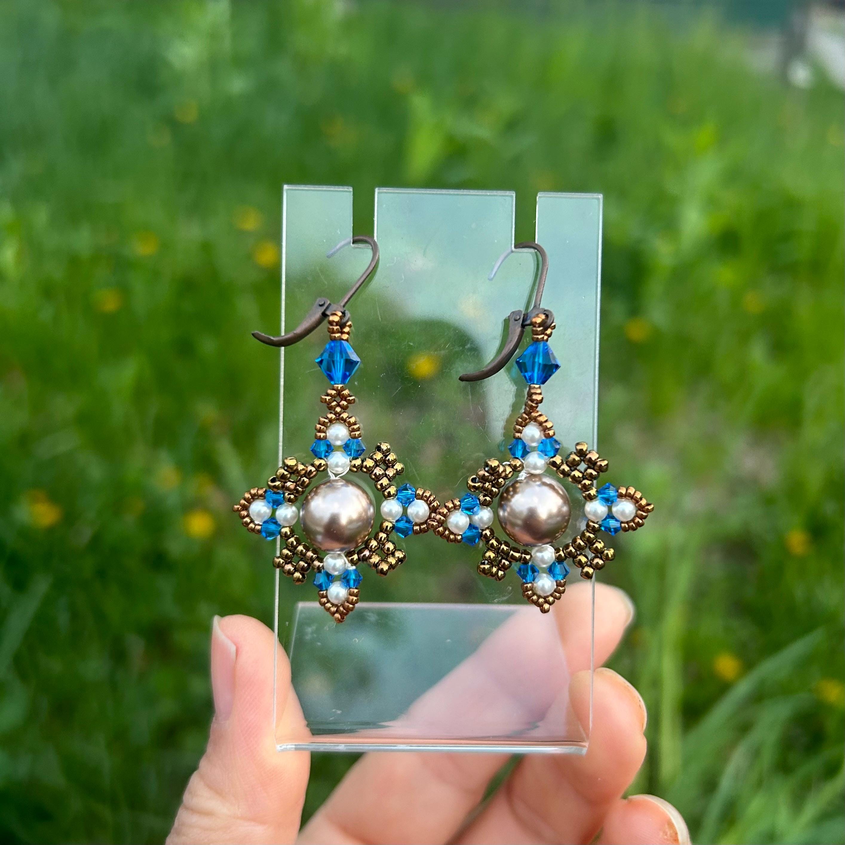 Swarovski クリスタルドロップピアス スワロフスキークリスタルドロップピアス：ブルーブロンズ幾何学模様