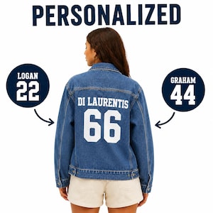 May include: A blue denim jacket featuring white block lettering on the back that reads DI LAURENTIS above the number 66. The jacket has a classic collar, long sleeves, and buttoned cuffs. Two circular graphics show examples of personalization.