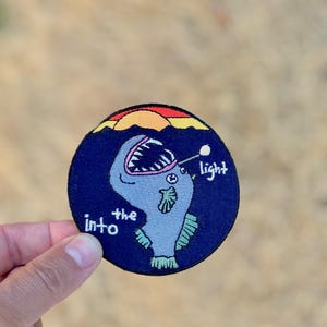 Anglerfish Marine Patch: Environmental Activism Sew-On Applique Into the Light, ocean, sunset