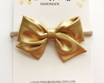 gold bow for baby