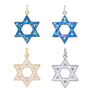 May include: Four Star of David pendants. Two are blue with gold and silver accents, and two are white with gold and silver accents. Each pendant has a loop at the top for a chain.