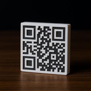 May include: A square, three-dimensional QR code with a white border and a black and white pattern. The code is set on a wooden surface with a dark background.