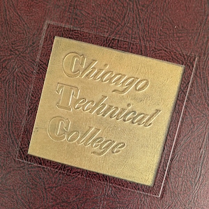 May include: A set of three ceramic mugs with a speckled, matte finish. The mugs are in shades of cream, light gray, and dark gray. Each mug has a simple, modern design and a rounded handle.