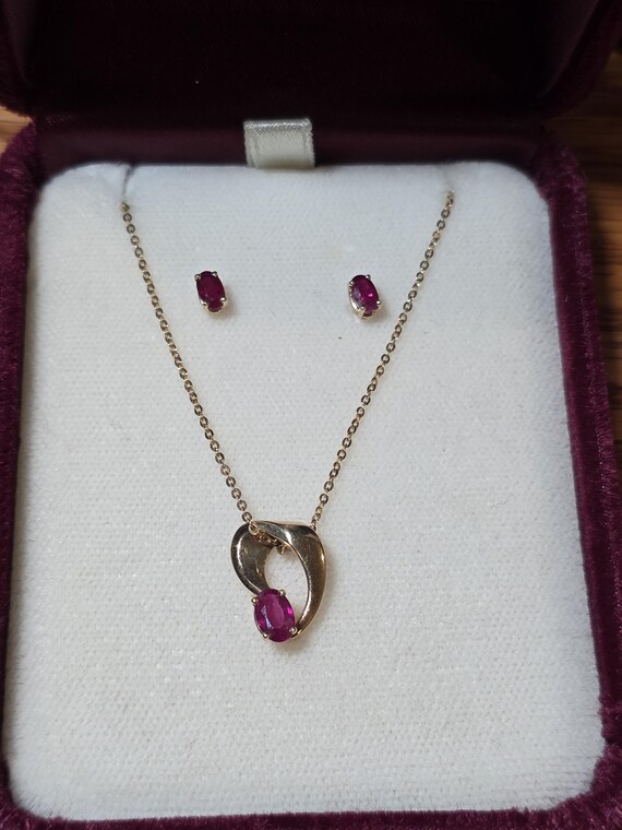 14k ruby pendant and stud earing set - image 1