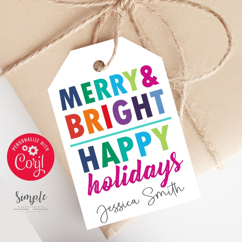 May include: A white gift tag with the text "Merry & Bright Happy Holidays" in rainbow colours. The name "Jessica Smith" is written in black at the bottom of the tag.
